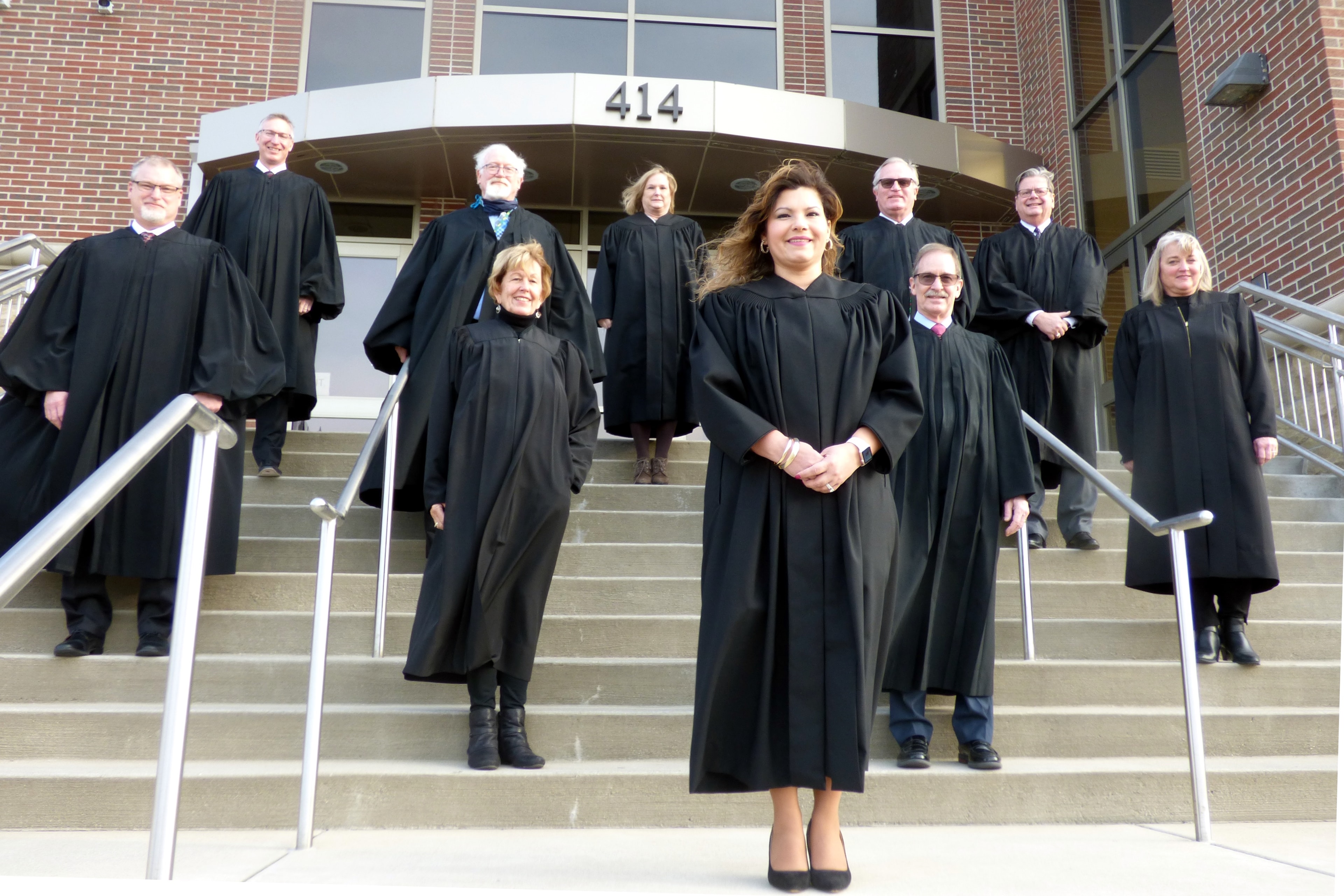 Judge Juanita F. Bocanegra and fellow 58th District Court judges outside the courthouse